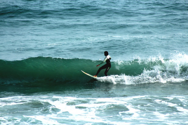 helping kids find their feet surfing in Peru